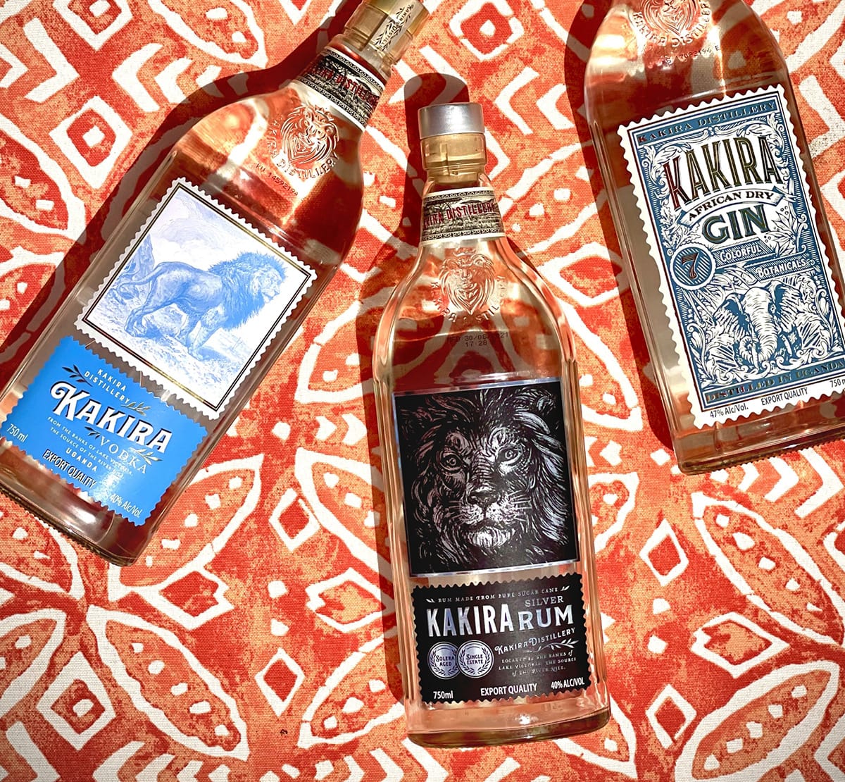 Photo of three Kakira Spirits: gin, rum, and vodka